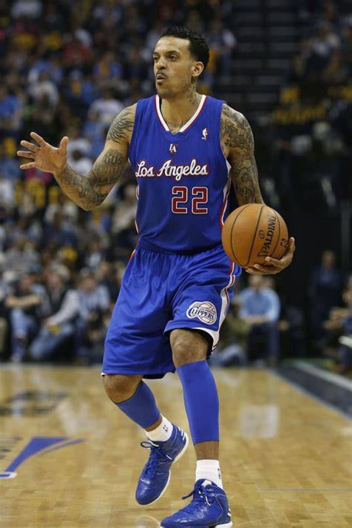 Former NBA star Matt Barnes spits at his fiancee's exhusband at an NFL